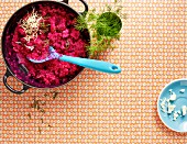 Beetroot risotto in a pot (seen from above)