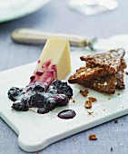 Hard cheese with berry jam and wholemeal toast