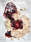 Plum pie with slivered almonds (seen from above)