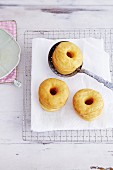 Fried croissant-doughnuts on kitchen towel