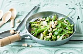 Green stir-fried vegetables with cashew nuts