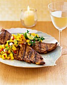 Grilled steak with mango salsa