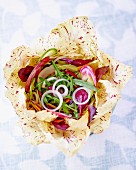 Radicchio salad with rocket and onions (seen from above)