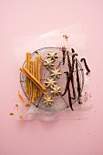 Crispy cinnamon wafer sticks, aniseed stars and baked vanilla pods
