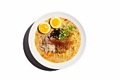 Miso ramen noodle soup with pork, bean sprouts, spring onions, mushrooms and egg (Japan)
