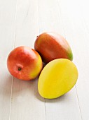 Keitt mangos from Florida, whole and halved