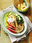 Fish skewers with thyme and unleavened bread