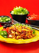 Überbackene Enchiladas mit Hühnchen