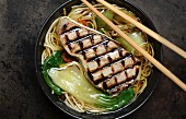 Noodle soup with grilled tuna steak and bok choy (China)