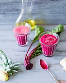 Vitamin-rich smoothies made with pineapple, beetroot and carrot juice