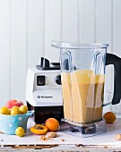 A smoothie made with peaches, apricots, mirabelles and almond biscuits