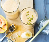 Papaya and coconut smoothies with lemongrass and pistachio nuts
