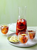 Iced tea with raspberries and lemon