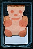 Bear-shaped processed meat in packaging