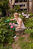 A young woman gardening