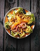 A chickpea salad with oranges and onions