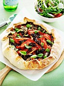 Mushroom pizza with olives and tomatoes