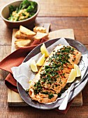 Baked salmon with herbs and chilli peppers