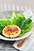 Chicken tartlet with cheese and a side salad