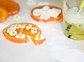 Candied orange peel decorated with daisies
