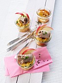 Potato gratin in glasses with prime boiled beef and apple