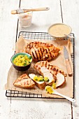 Grilled chicken breast with mango sauce and peanut sauce