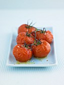 Roasted tomatoes with salt and olive oil