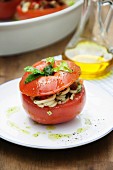 A tomato filled with pasta salad