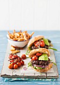 Burgers with avocado and tomatoes