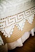 White lace bedspread with trim