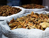 Dried figs in white sacks at an Indian market