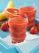 Fruit juice with strawberries, banana and grapefruit