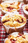 Strawberry muffins with apples and almonds (close-up)