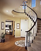 Brown and white balustrade on staircase in contemporary house