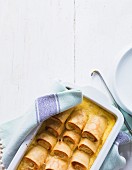 Topfenpalatschinken (Baked pancakes filled with curd cheese)