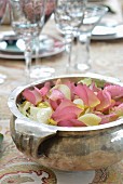 Silver dish of scented petals