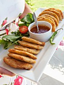 Breaded pastry parcels filled with prawns