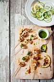 Chicken skewers with pesto and a cucumber and lemon salad