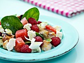 Chicken salad with watermelon and raspberries