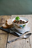 Lentil stew with bacon, carrots and creme fraiche