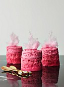 Raspberry mousse garnished with candy floss