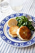 Smoked cod and spring onion fishcakes with watercress and lemon