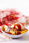 Grilled mango with orange and toffee sauce