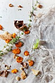 An arrangement of vegetables featuring nuts and thyme