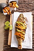 Grilled fish with chermoula and vegetables crudités