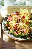 Curly endive salad with potatoes and goose stomach