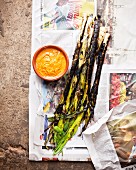 Grilled leek with Romesco (spicy tomato sauce)