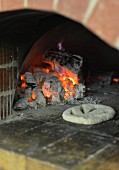 Unleavened bread in a wood-fired oven