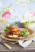 Salmon cakes with mushy peas