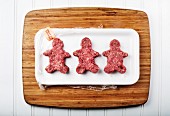 Minced meat in the shape of gingerbread men